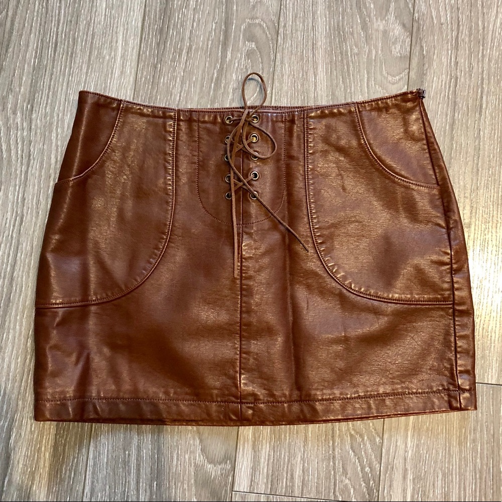 🎉HP 🎉.  F21 pleather tan tie- up skirt